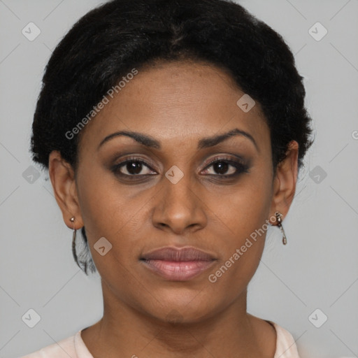 Joyful black young-adult female with short  brown hair and brown eyes