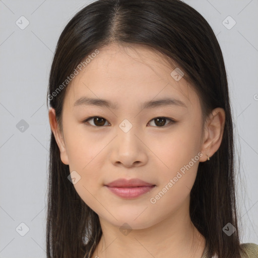 Joyful asian young-adult female with long  brown hair and brown eyes