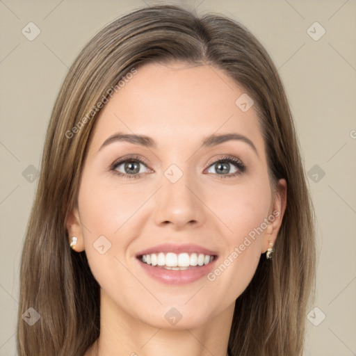 Joyful white young-adult female with long  brown hair and grey eyes