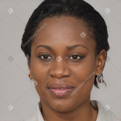 Joyful black young-adult female with medium  black hair and brown eyes