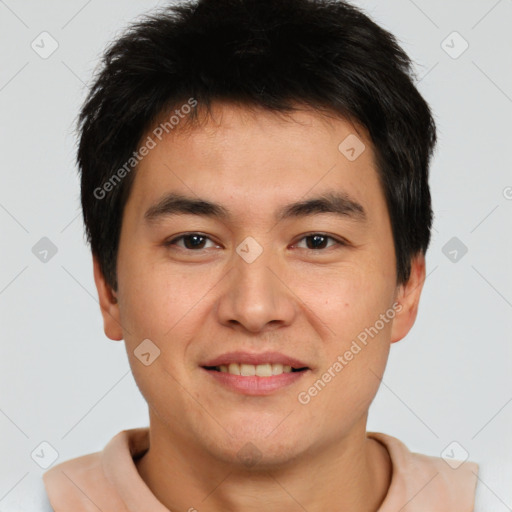 Joyful asian young-adult male with short  brown hair and brown eyes