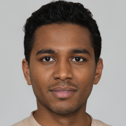 Neutral black young-adult male with short  black hair and brown eyes