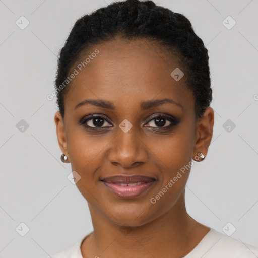 Joyful black young-adult female with short  black hair and brown eyes