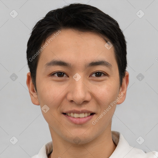 Joyful white young-adult male with short  black hair and brown eyes