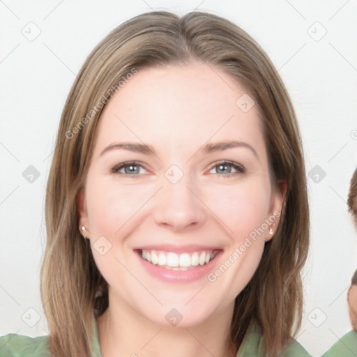 Joyful white young-adult female with medium  brown hair and green eyes