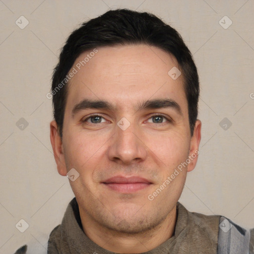 Joyful white young-adult male with short  black hair and brown eyes