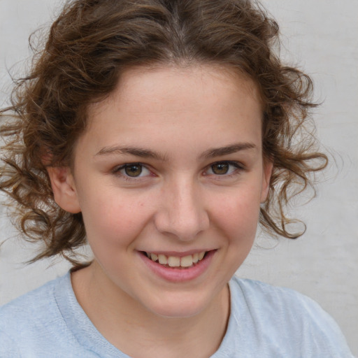 Joyful white child female with medium  brown hair and brown eyes