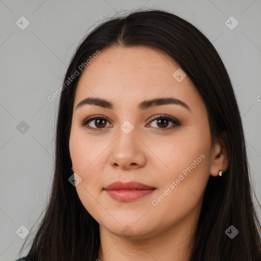 Joyful white young-adult female with long  black hair and brown eyes