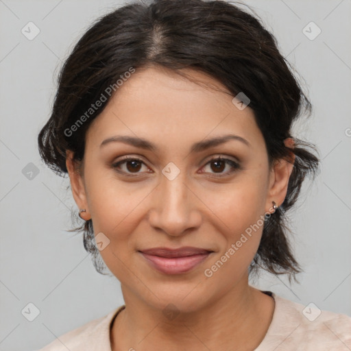 Joyful latino young-adult female with medium  brown hair and brown eyes