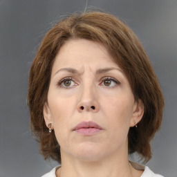 Neutral white adult female with medium  brown hair and brown eyes