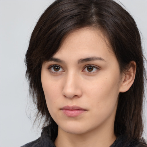 Neutral white young-adult female with medium  brown hair and brown eyes