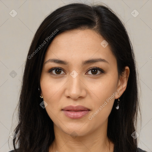 Joyful latino young-adult female with long  brown hair and brown eyes