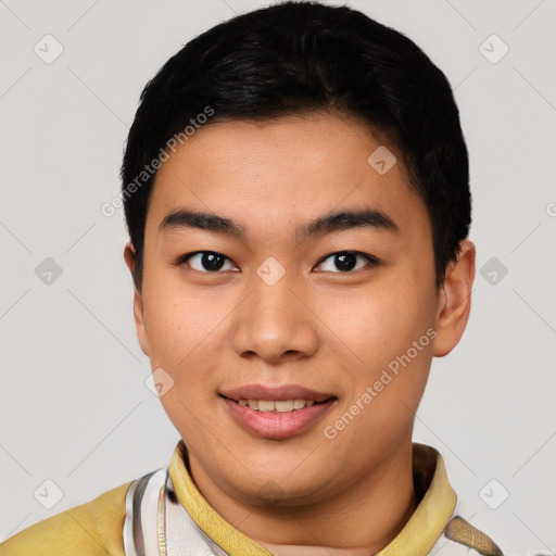 Joyful latino young-adult male with short  black hair and brown eyes