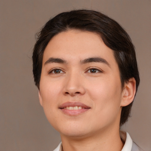 Joyful white young-adult male with medium  brown hair and brown eyes