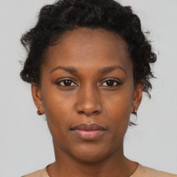 Neutral black young-adult female with short  brown hair and brown eyes