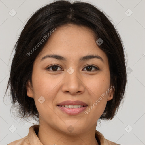 Joyful latino young-adult female with medium  brown hair and brown eyes