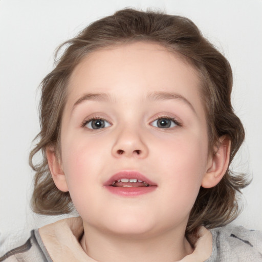 Joyful white child female with medium  brown hair and blue eyes