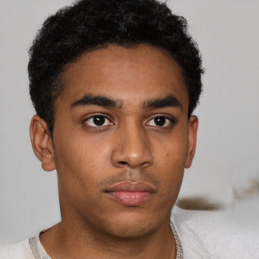 Neutral black young-adult male with short  brown hair and brown eyes