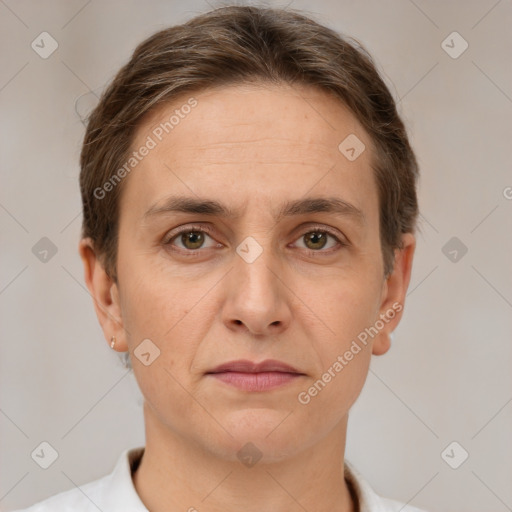 Joyful white adult female with short  brown hair and brown eyes