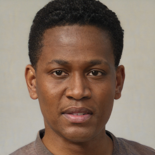 Neutral black young-adult male with short  black hair and brown eyes