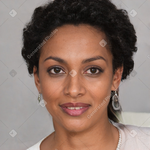 Joyful black young-adult female with short  brown hair and brown eyes