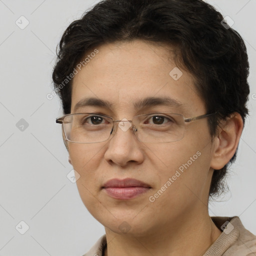 Joyful white adult female with short  brown hair and brown eyes