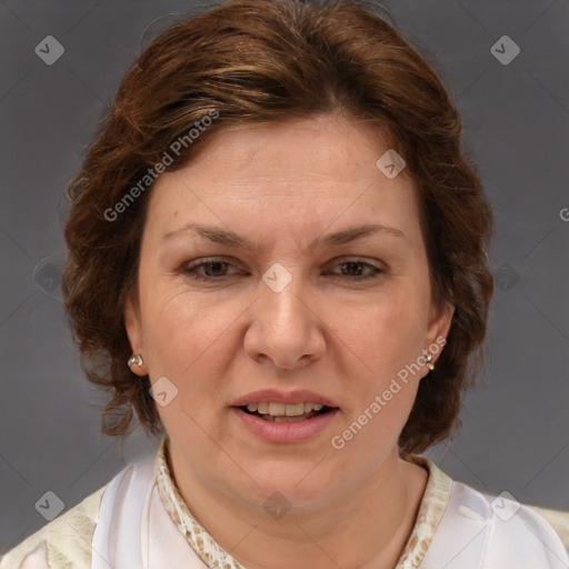 Joyful white adult female with medium  brown hair and blue eyes