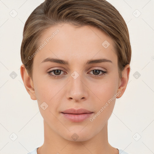 Joyful white young-adult female with short  brown hair and brown eyes