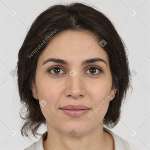 Joyful white young-adult female with medium  brown hair and brown eyes