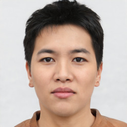 Neutral asian young-adult male with short  black hair and brown eyes