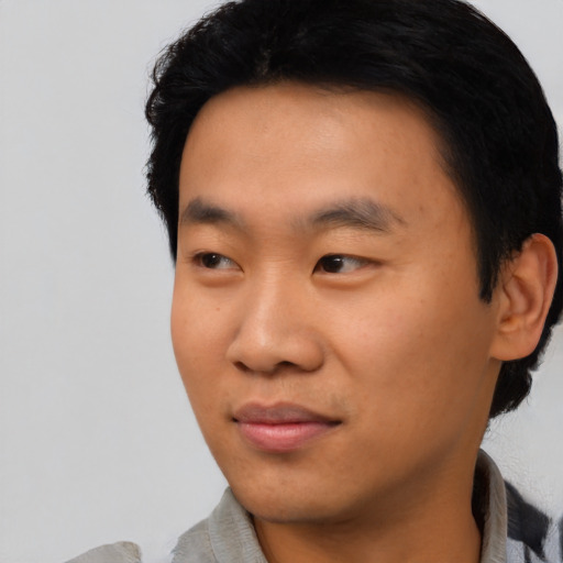 Neutral asian young-adult male with short  black hair and brown eyes