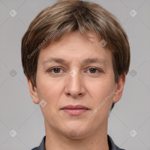 Joyful white adult male with short  brown hair and grey eyes