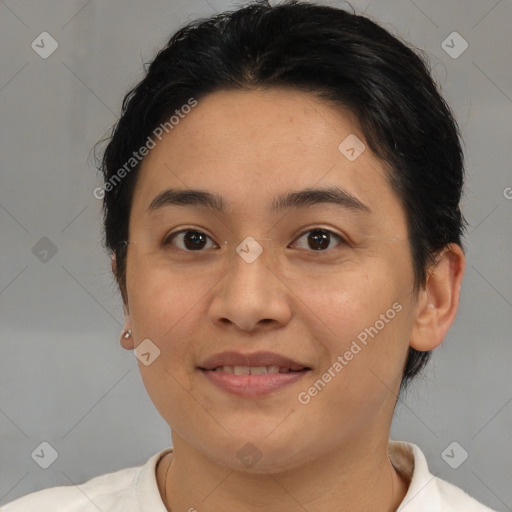 Joyful latino young-adult female with short  brown hair and brown eyes