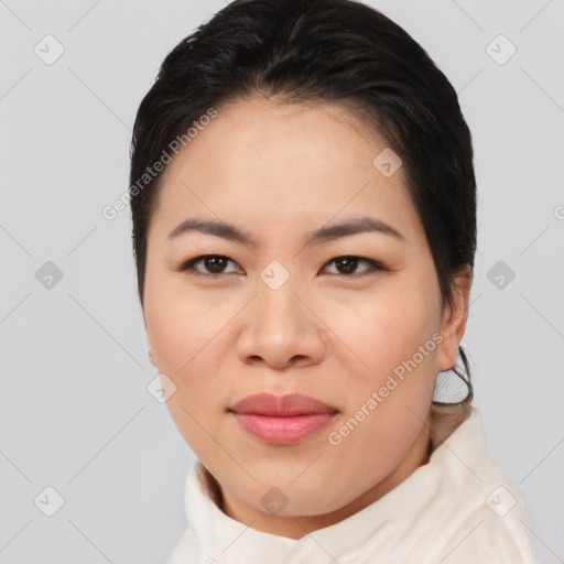 Joyful asian young-adult female with short  brown hair and brown eyes