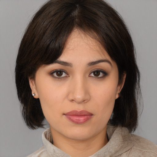 Neutral white young-adult female with medium  brown hair and brown eyes