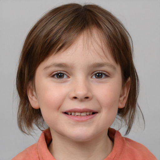 Joyful white child female with medium  brown hair and blue eyes