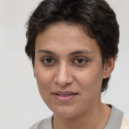 Joyful white adult female with short  brown hair and brown eyes