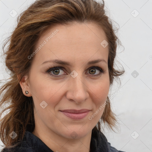 Joyful white adult female with long  brown hair and brown eyes