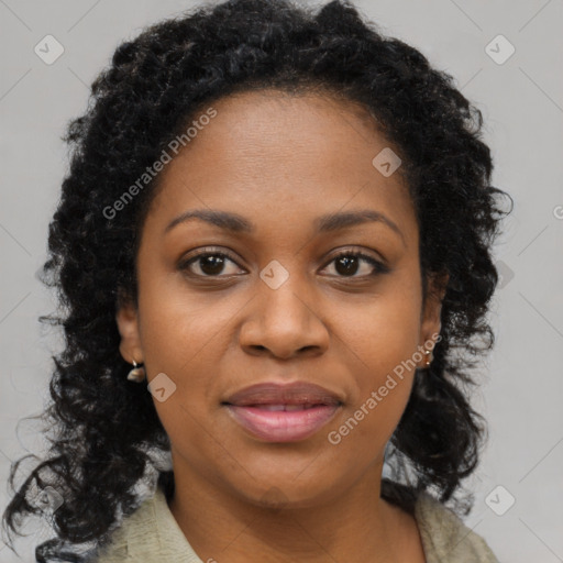 Joyful black young-adult female with medium  brown hair and brown eyes