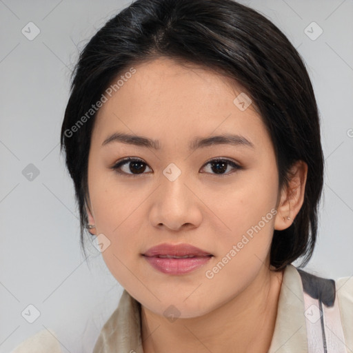 Joyful white young-adult female with medium  black hair and brown eyes