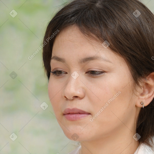 Neutral white young-adult female with medium  brown hair and brown eyes