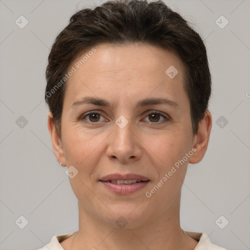 Joyful white adult female with short  brown hair and brown eyes