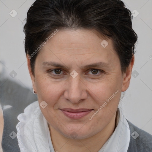 Joyful white adult female with short  brown hair and brown eyes