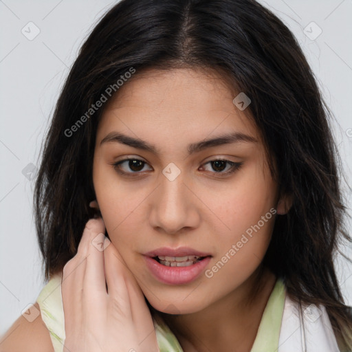 Joyful white young-adult female with long  brown hair and brown eyes