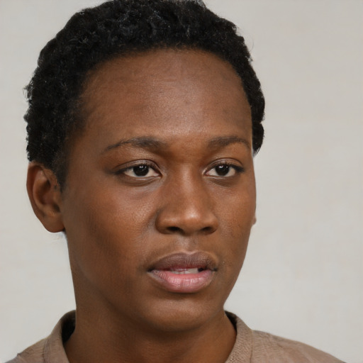 Neutral black young-adult female with short  brown hair and brown eyes