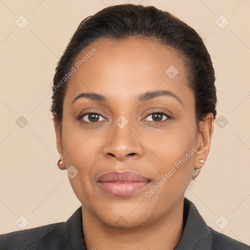 Joyful latino young-adult female with short  brown hair and brown eyes