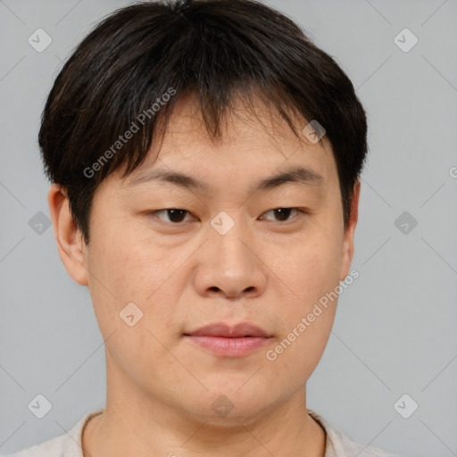 Neutral asian young-adult male with short  brown hair and brown eyes