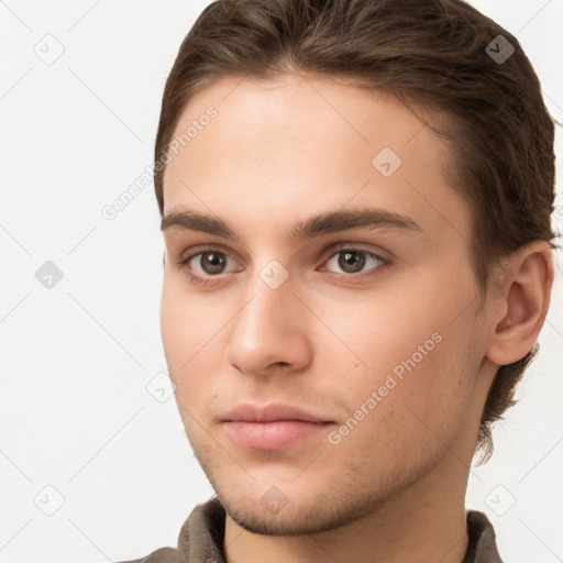 Neutral white young-adult male with short  brown hair and grey eyes