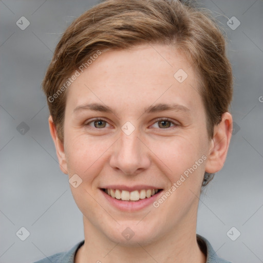 Joyful white young-adult female with short  brown hair and grey eyes