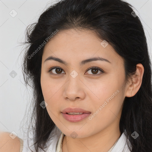 Joyful asian young-adult female with long  brown hair and brown eyes